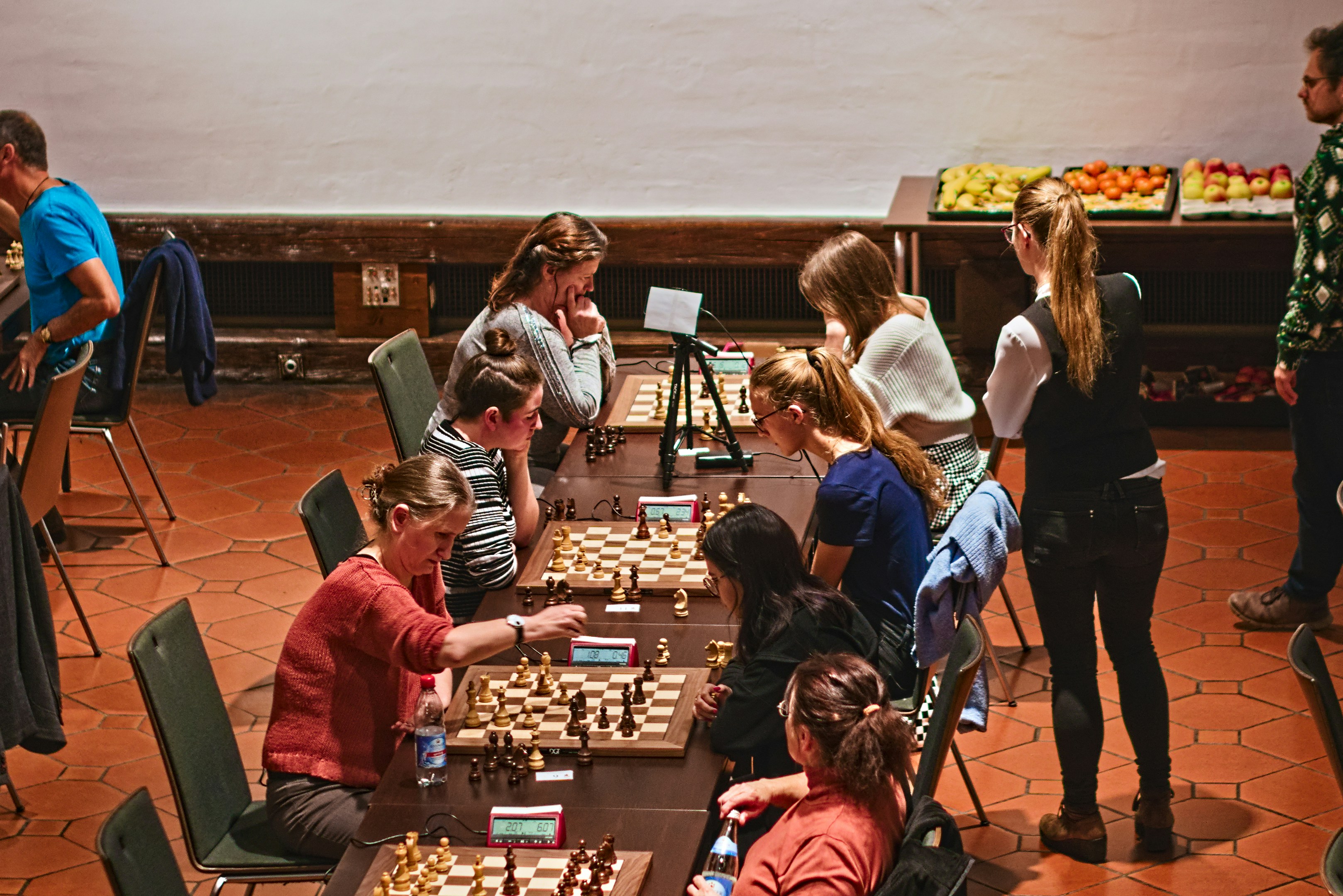 Community Icon, group of people playing in hall