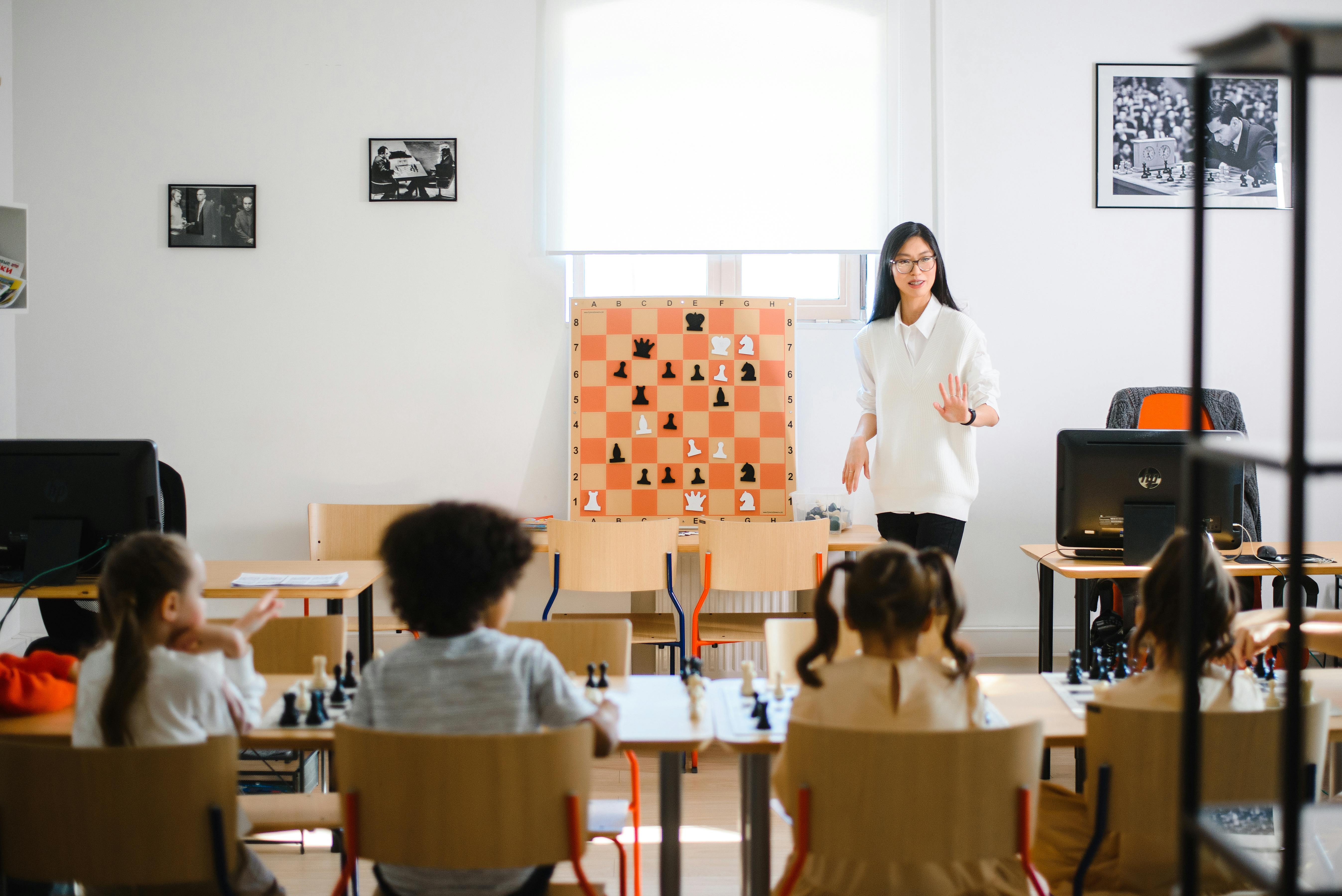 Club in Action 3, children having chess lessons with a teacher